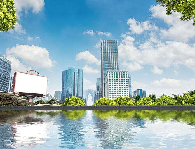 "Modern building on a scenic riverbank with stunning architecture"